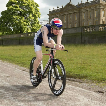 Man riding TT bike