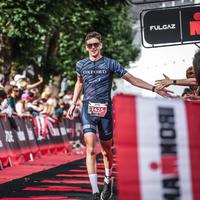 Seb finishing IRONMAN 70.3 Zell am See